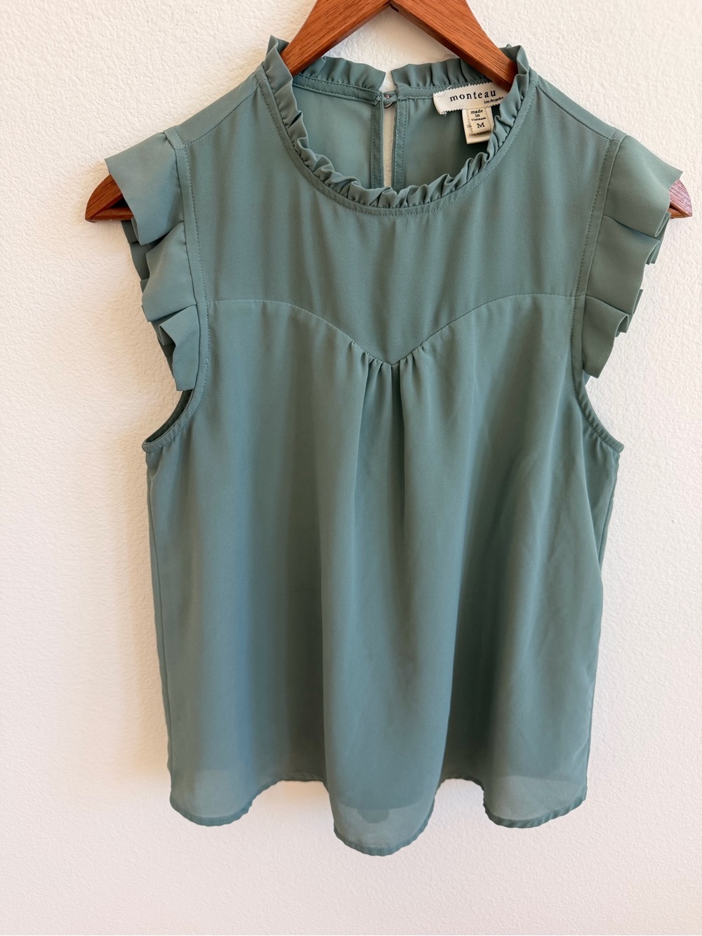 Montteau Sleeveless Ruffle Neck Top in Sage Green